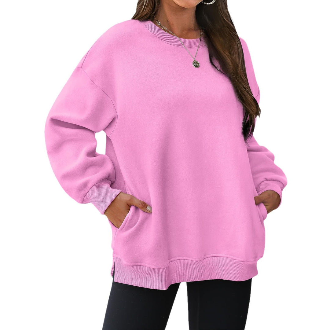 Damen verlängertes Oversize Rundhalspullover mit seitlichen Eingrifftaschen, Rippbündchen und überschnittener Schulter – Mavelle