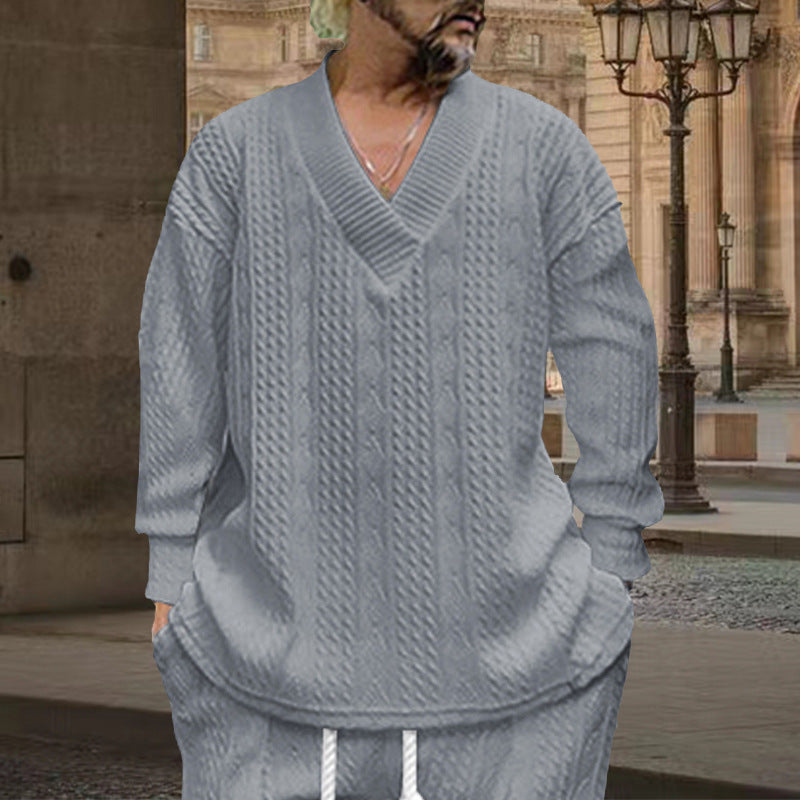 Herren nan grob gestrickter V-Ausschnitt-Pullover mit Zopfmuster und relaxed Fit Echo Archiv