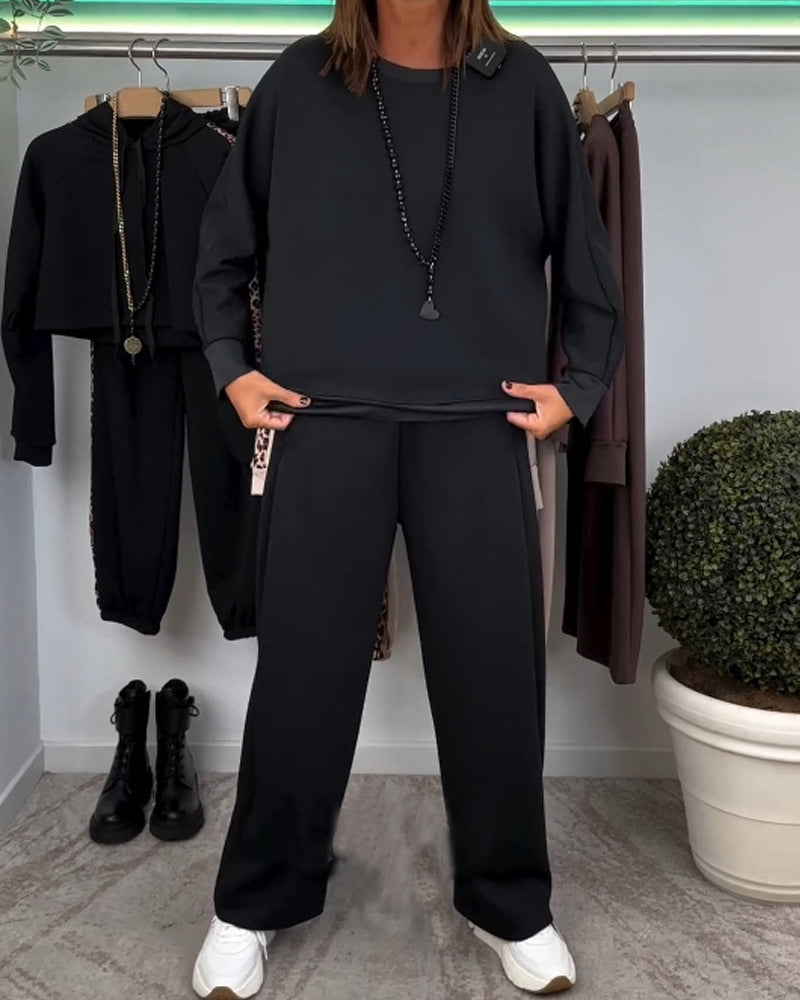 Damen nan Oversize-Jogging-Set mit kastigem Sweatshirt und weiter Palazzo-Hose mit dekorativem Seitenband Echo Archiv