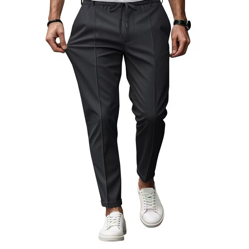 Herren elegante Freizeit-Hose mit elastischem Bund und seitlichen Eingrifftaschen Echoarchiv