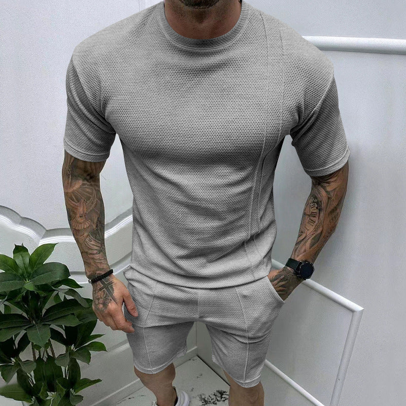 Herren sportliches Kurzarm-Set mit atmungsaktivem Material und funktionalen Details Echoarchiv