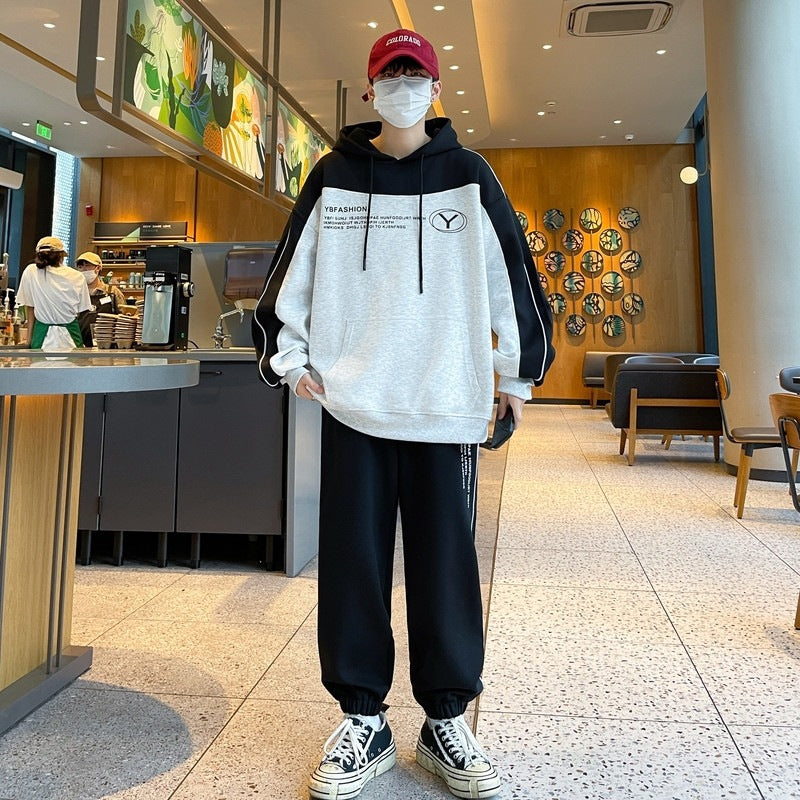 Herren Oversize-Trainingsset mit Block-Design Hoodie und konischer Jogginghose Echoarchiv