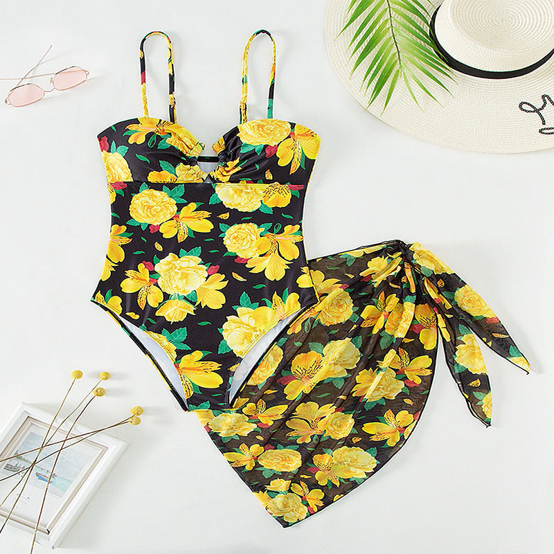 Damen Einteiliger Badeanzug mit floralem Design und passendem Wickelrock Echo Archiv