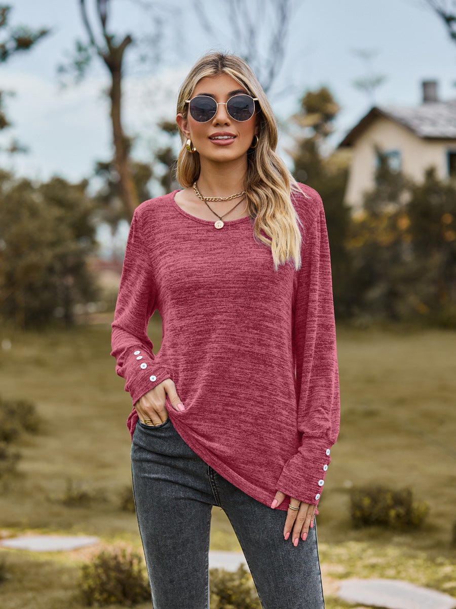 Damen Lässiges Langarmshirt mit Knopfmanschetten und weitem Rundhalsausschnitt Echo Archiv