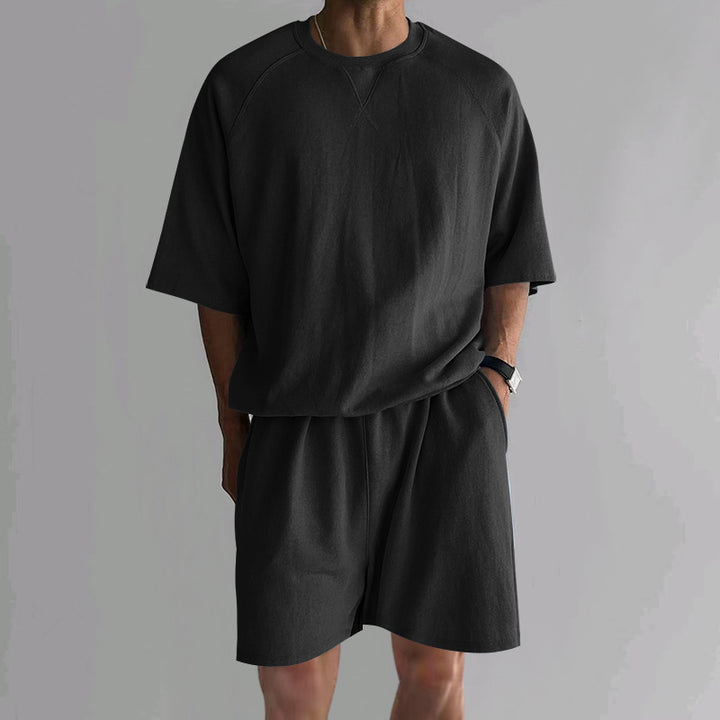 Herren lässiges Sportoutfit mit weitem Schnitt und atmungsaktivem Material Echoarchiv