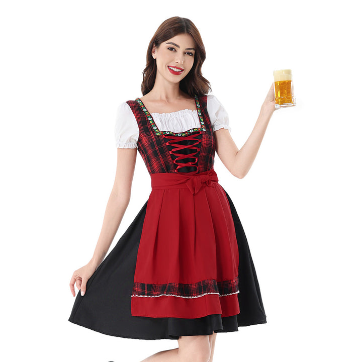Damen nan traditionelles Dirndlkleid mit kariertem Mieder, Schnürung, Puffärmeln und Schürze Echo Archiv