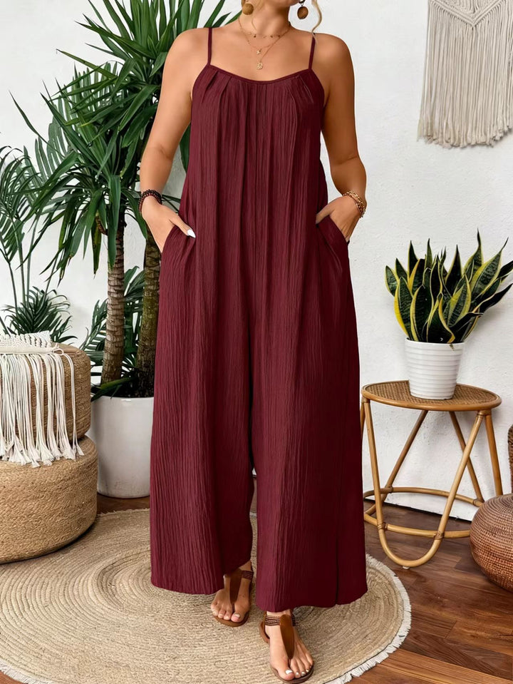 Damen luftiger Jumpsuit mit schmalen Spaghettiträgern und seitlichen Taschen Echo Archiv