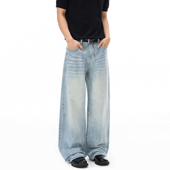 Herren Weitfallende Loose-Palazzo-Denimjeans mit tiefem Schritt und heller Used-Waschung Echo Archiv