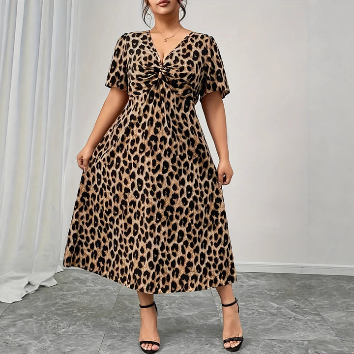 Damen Maxikleid mit raffiniertem Knotendesign und modernem Tiermuster Echo Archiv