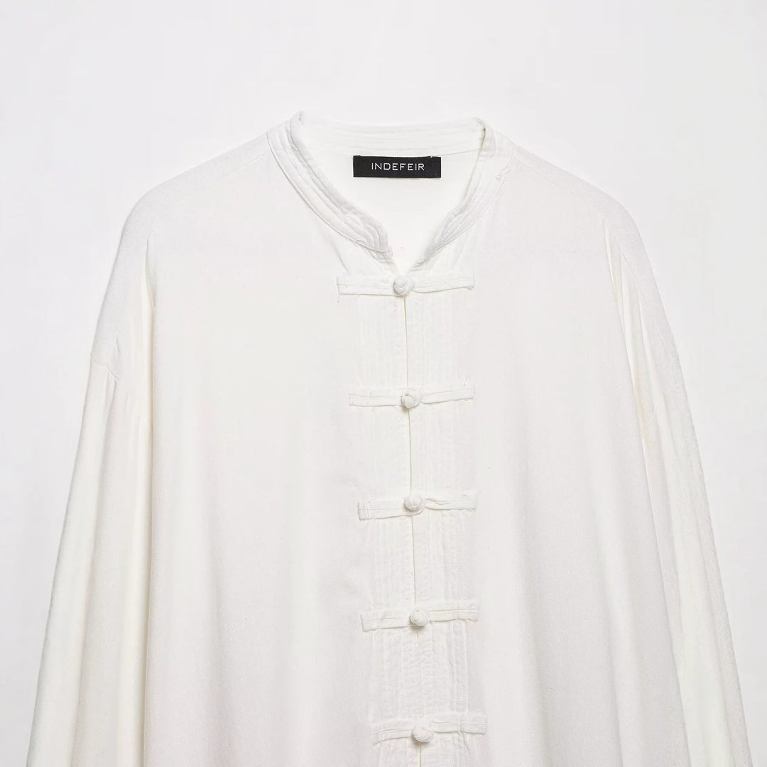 Damen Oversize Tunika‑Bluse im asiatisch inspirierten Stil mit Stehkragen und Zierknotenverschlüssen Echo Archiv
