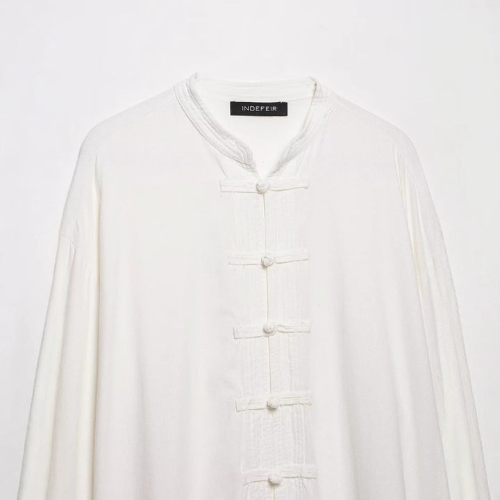 Damen Oversize Tunika‑Bluse im asiatisch inspirierten Stil mit Stehkragen und Zierknotenverschlüssen Echo Archiv