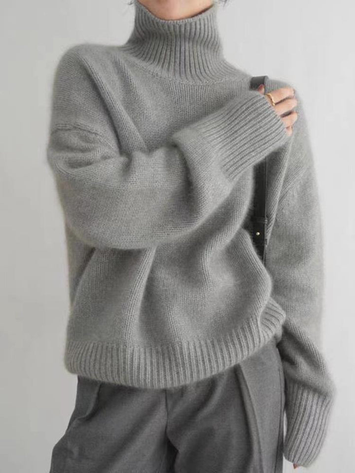 Damen Oversize Feinstrickpullover mit hohem Rollkragen und Seitenschlitzen – Mavelle