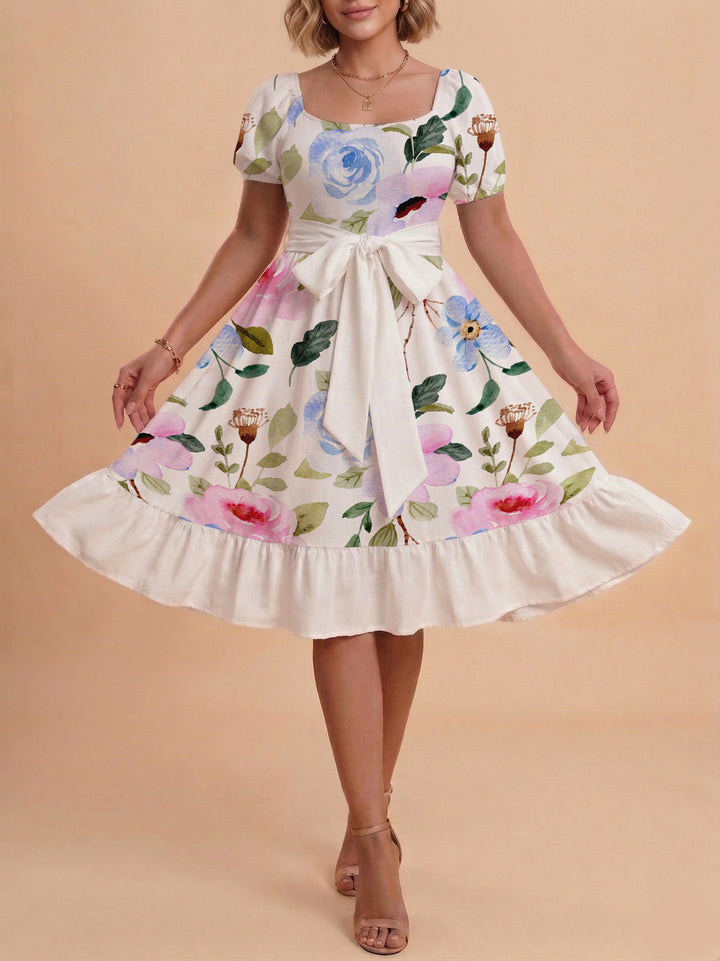Damen Sommerliches Blumenkleid mit taillierbarem Gürtel und voluminösen Ärmeln Echo Archiv