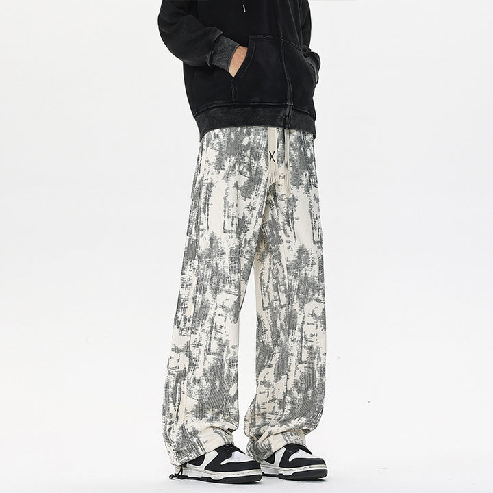 Herren Weit geschnittene Loungehose mit abstraktem Allover‑Print, elastischem Bund und Tunnelzug Echo Archiv