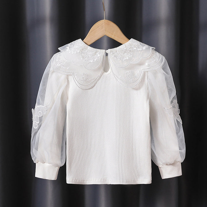 Mädchen modische Bluse mit eleganten Tüllärmeln und kunstvoller Spitzenverzierung Echo Archiv