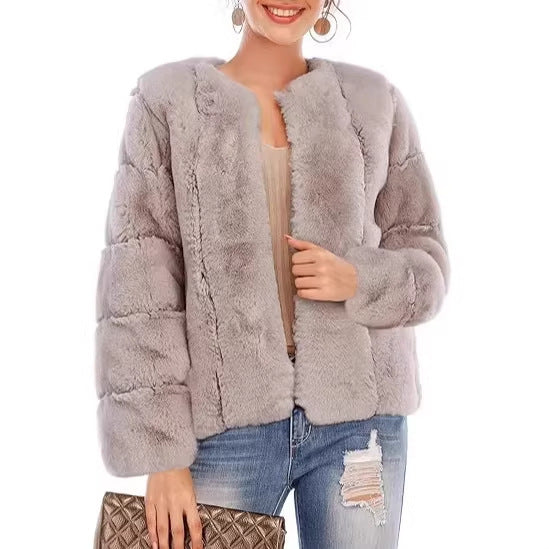 Damen Kurze Plüsch-Bomberjacke aus Kunstpelz mit kastiger Silhouette und Paneelärmeln Echo Archiv