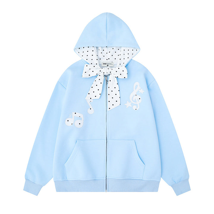 Damen Kapuzensweatjacke mit gepünktetem Kapuzenfutter, dekorativer Schleife und Notenmotiv Echoarchiv
