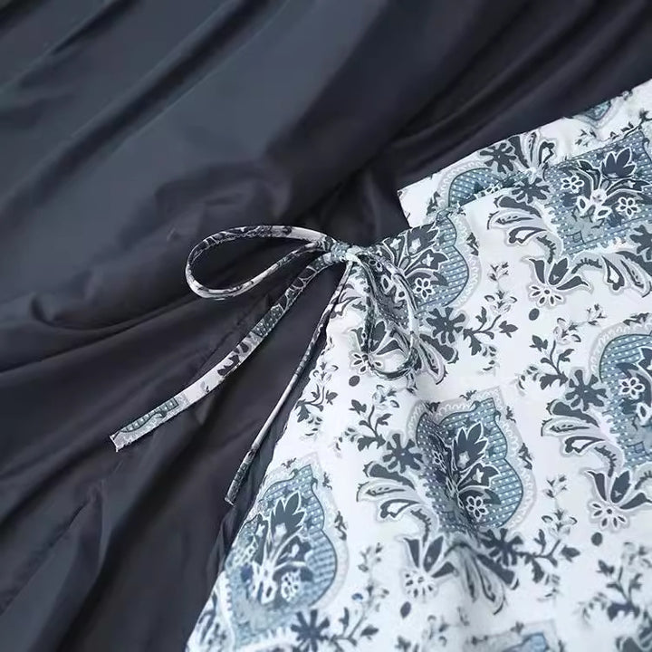 Damen Wickeljacke mit orientalischem Medaillonprint, leichter Wattierung und kontrastpaspel – Célinea