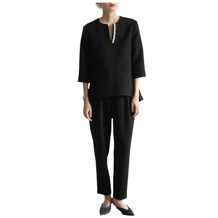 Damen Elegante Bluse mit Perlendetails Echoarchiv