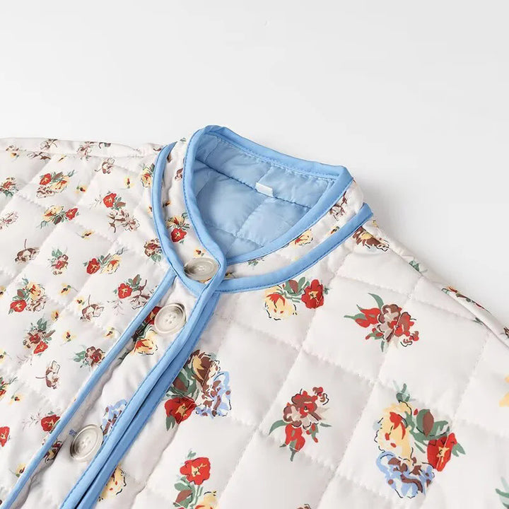Damen gesteppte Boxy-Jacke mit floralem Alloverprint, kontrastierender Paspel und aufgesetzten Klappentaschen – Célinea