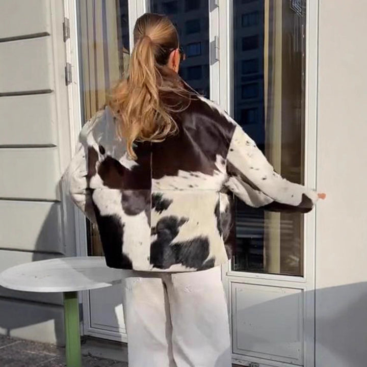 Damen Kurzjacke aus Haarigem Kunstfell mit Patchwork‑Optik und hohem Stehkragen Echoarchiv