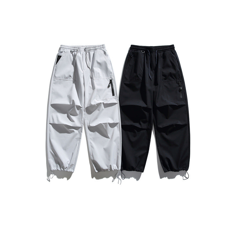 Unisex Technische Cargo-Joggerhose mit elastischem Bund, Reißverschlusstasche und Kordelzug Echoarchiv