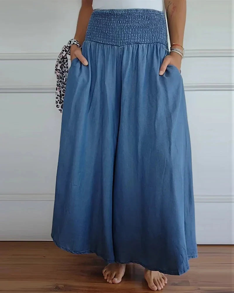 Damen-Maxi-Rock mit hohem Smockbund, weitem Fall und seitlichen Taschen – Valéora