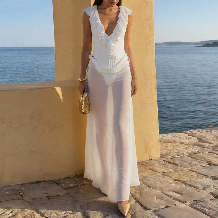 Damen Elegantes Strandkleid mit fransigen Details und tiefem V-Ausschnitt Echo Archiv