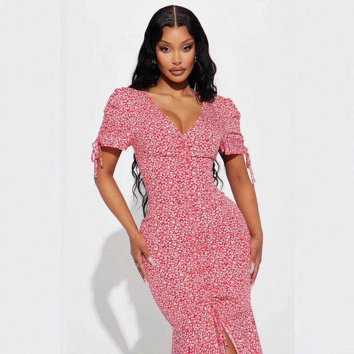 Damen Midi-Kleid mit floralen Mustern und luftigen Rüschendetails Echo Archiv