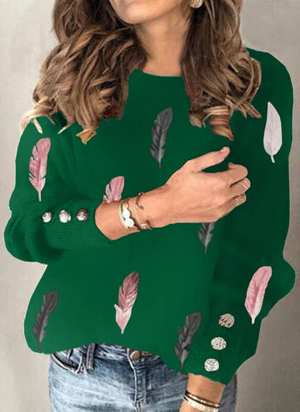 Damen Feinstrickpullover mit Federmotiv, Rundhalsausschnitt und dekorativer Knopfleiste Echoarchiv