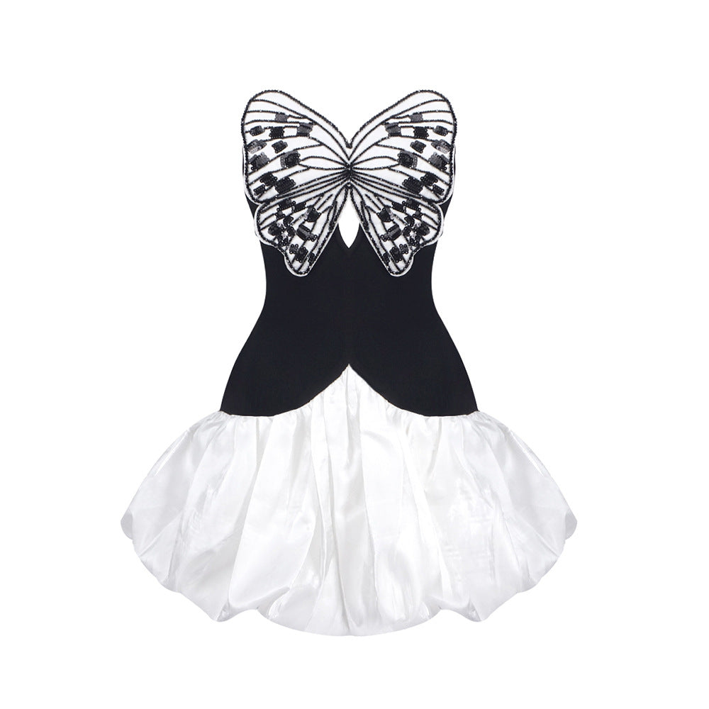 Damen Elegantes Cocktailkleid mit einzigartigem Schmetterlingsdesign und voluminösem Rock Echo Archiv