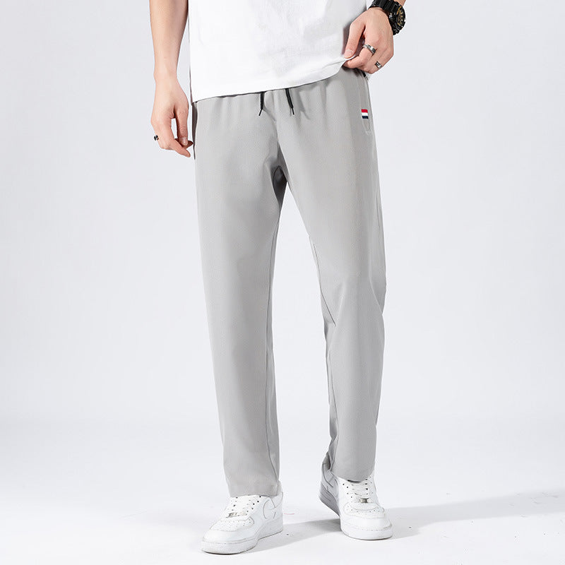 Herren Sportliche Jogginghose mit elastischem Bund und Seitentaschen Echo Archiv