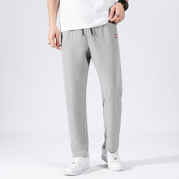Herren Sportliche Jogginghose mit elastischem Bund und Seitentaschen Echo Archiv