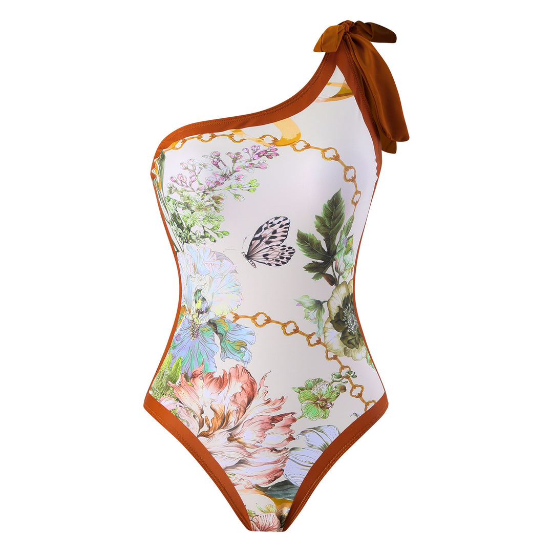 Damen Einteiler Badeanzug mit asymmetrischem Schnitt und elegantem Wickelrock Echo Archiv