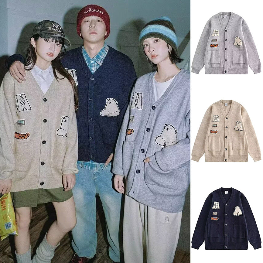 Damen Gemütliche Strickjacke mit bunten Applikationen Echoarchiv