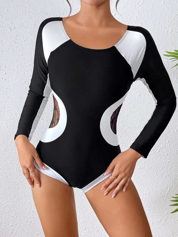 Damen Sportlicher Langarm Badeanzug mit transparenten Einsätzen Echo Archiv