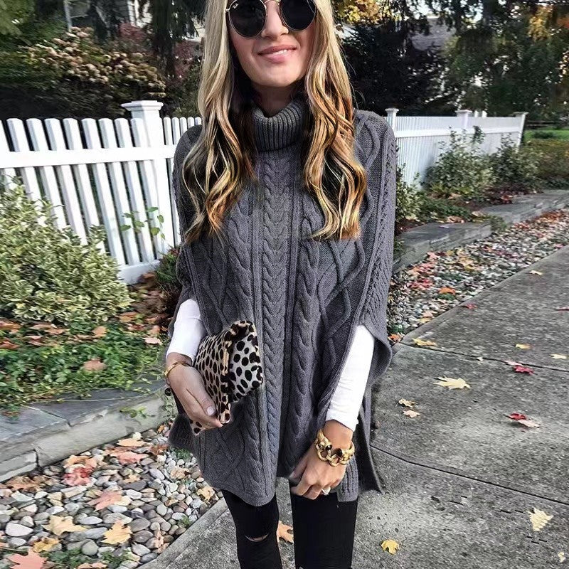 Damen nan kastiger Strickponcho mit hohem Rollkragen, Zopfstruktur und seitlichen Schlitzen Echo Archiv