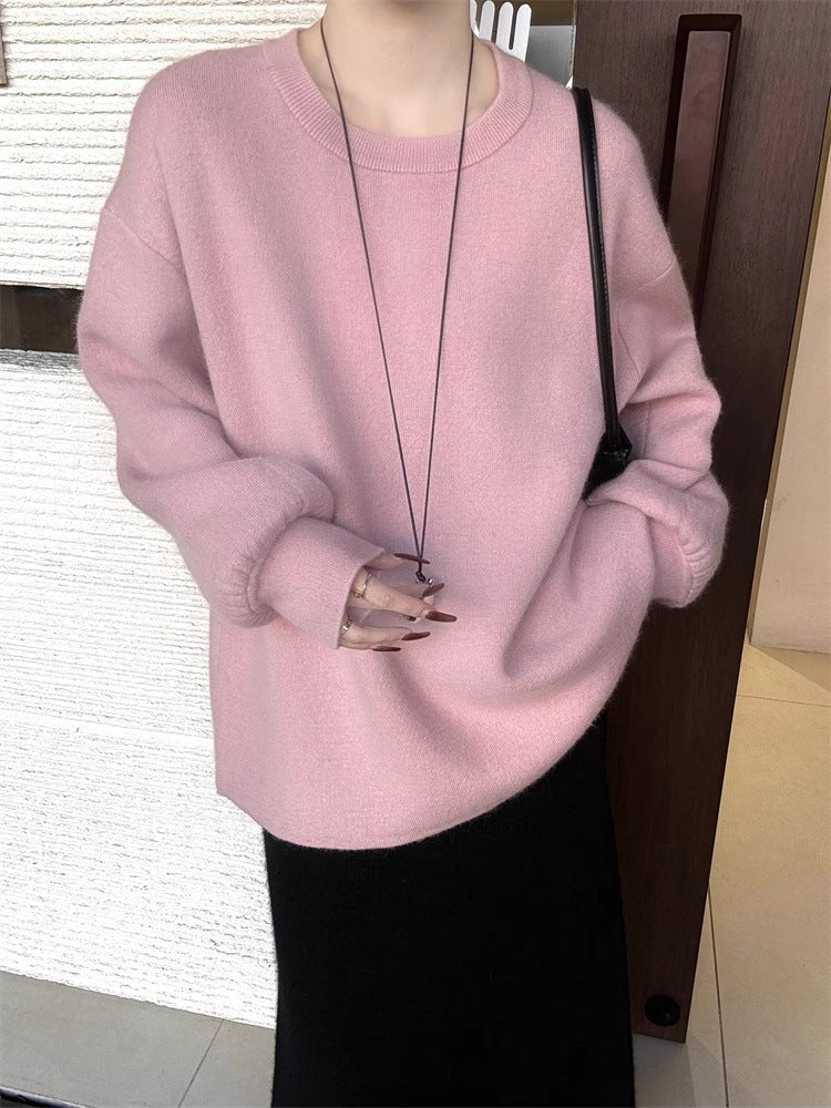 Damen Oversize-Feinstrickpullover mit Ballonärmeln und Knopfmanschette Echoarchiv
