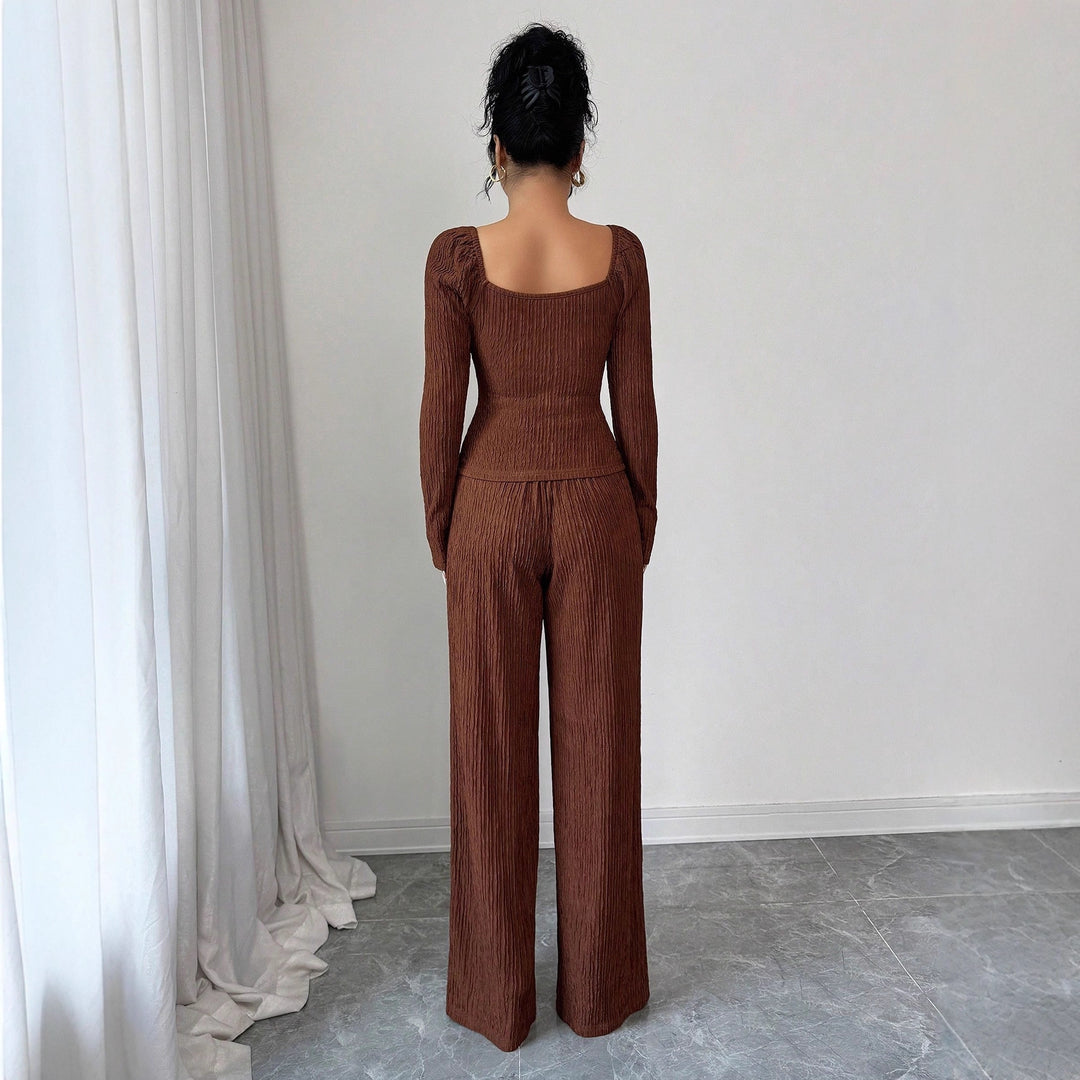 Damen nan tailliertes Blusen- und Hosen-Set aus Crinkle-Plissee mit Puffärmeln und Zierknöpfen Echo Archiv