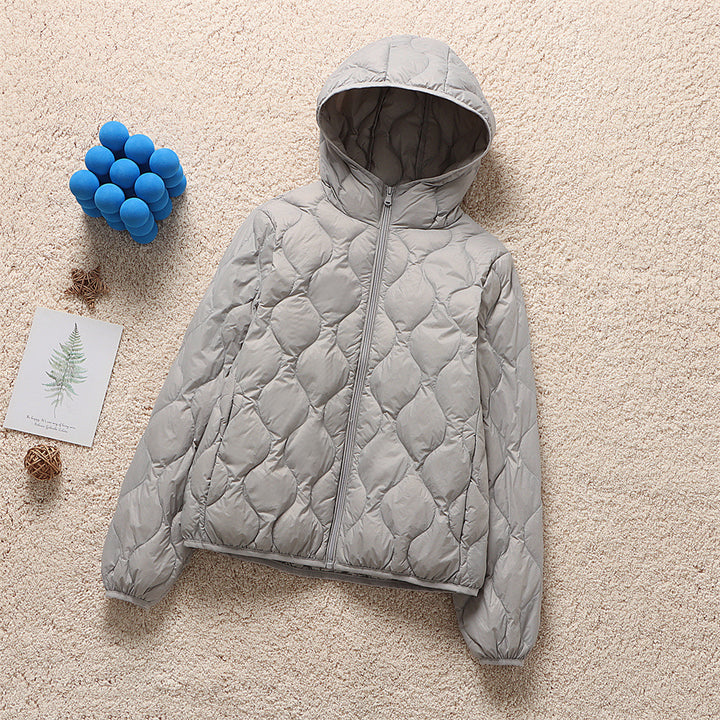 Damen Kapuzen-Steppjacke mit tropfenförmiger Steppung und ultraleichter Thermofüllung Echoarchiv