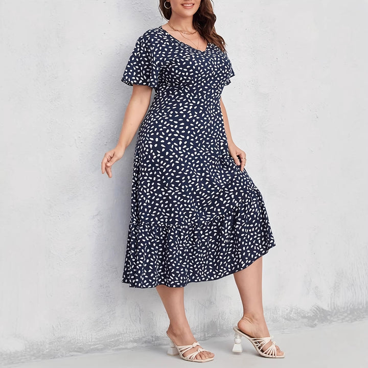 Damen Midi-Kleid mit fließendem Schnitt und verspieltem Muster Echo Archiv