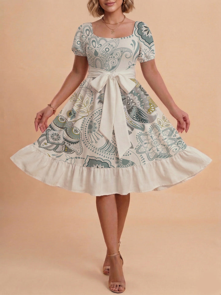 Damen modernes Blumenkleid mit elegantem Taillengürtel und asymmetrischem Saum Echo Archiv