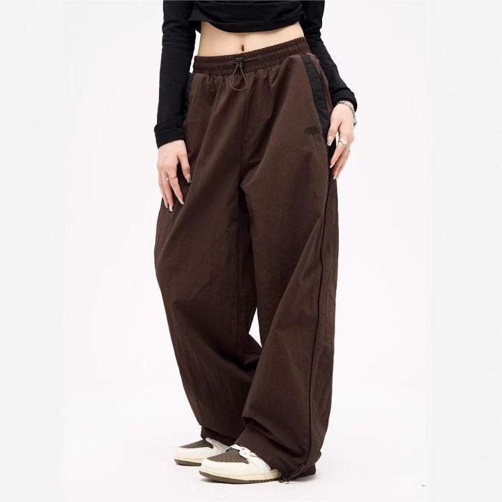 Damen nan weite Trackhose mit Kontrastpaspel, elastischem Bund und Oversize-Schnitt Echo Archiv