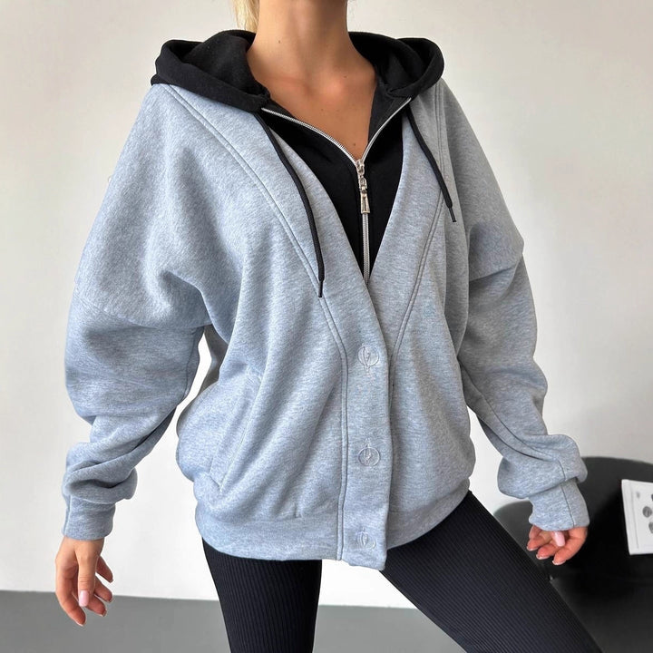 Damen Oversized Kapuzenjacke mit Druckknopfverschluss und Eingrifftaschen Echoarchiv