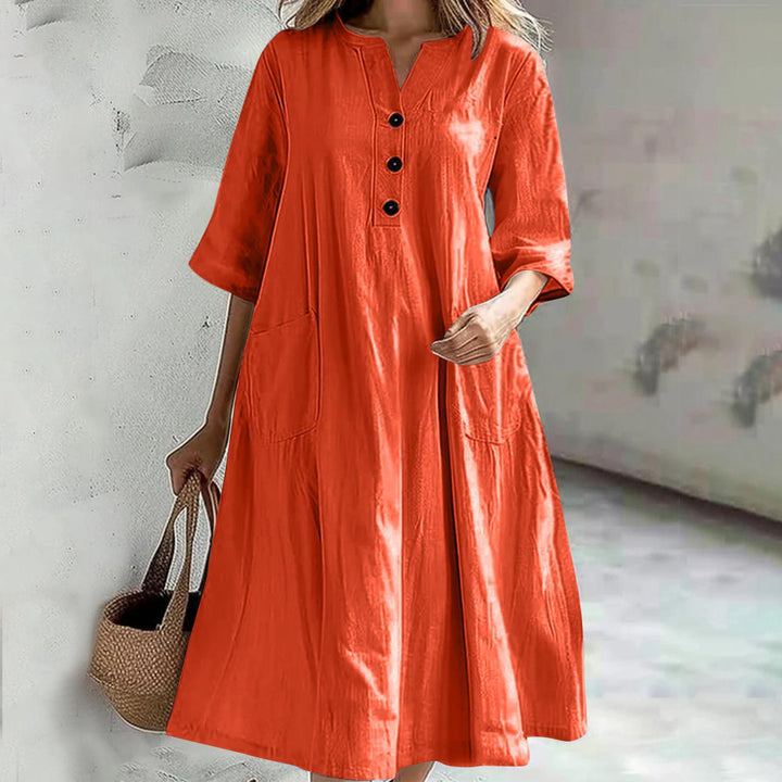 Damen nan locker fallendes A-Linien Kleid mit V-Ausschnitt-Knopfleiste, 3/4-Ärmeln und aufgesetzten Eingrifftaschen Echo Archiv