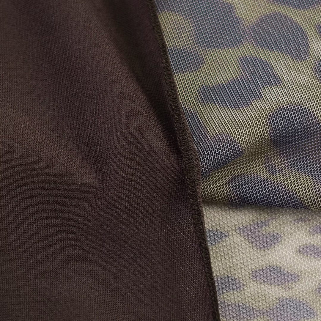 Damen Midirock mit Leopardenprint und ausgestellter Chiffonlage Echoarchiv