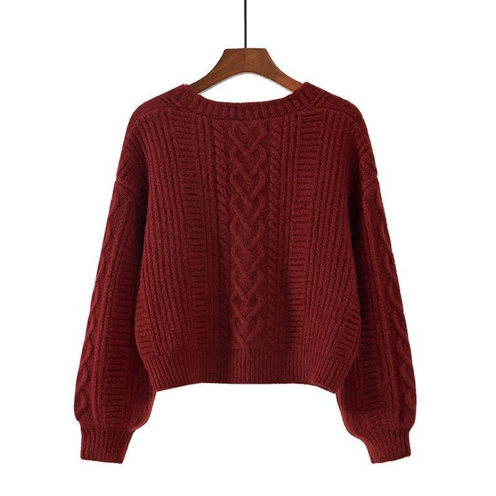 Damen Strickjacke mit ausgefallenem Zopfmuster und tiefem V-Ausschnitt Echoarchiv