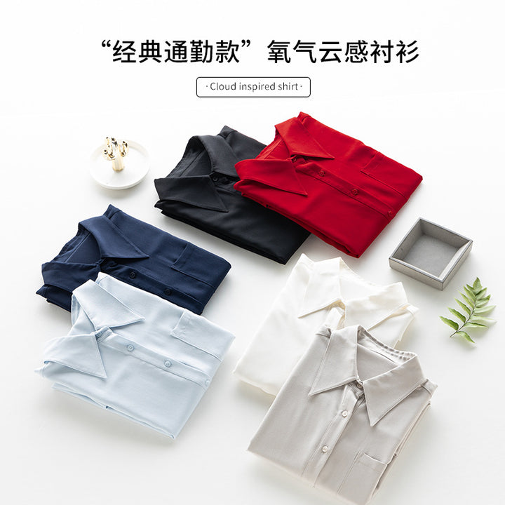 Damen seidenähnliche Oversize-Bluse mit spitzem Hemdkragen und Brusttasche Echo Archiv