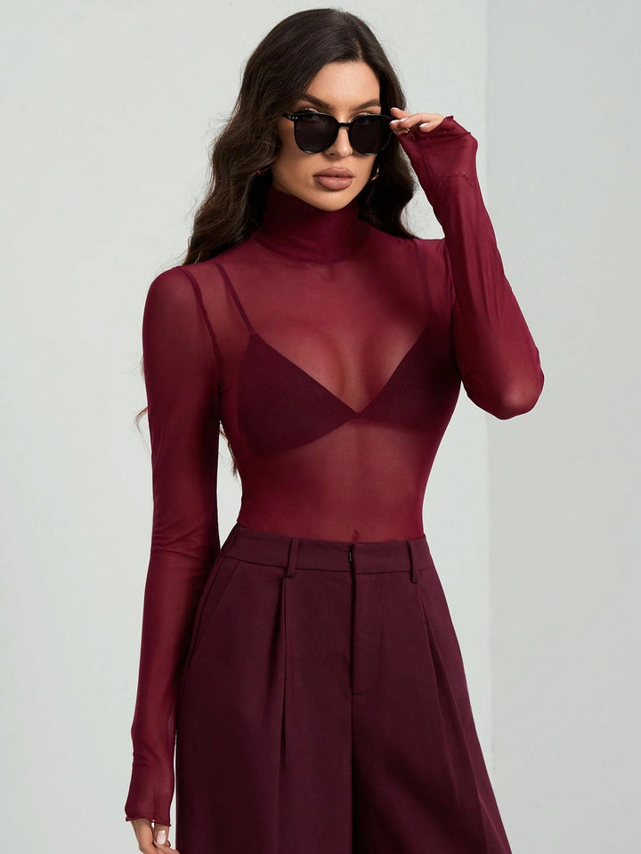 Damen Transparente Turtleneck-Bluse mit figurformendem Schnitt Echoarchiv