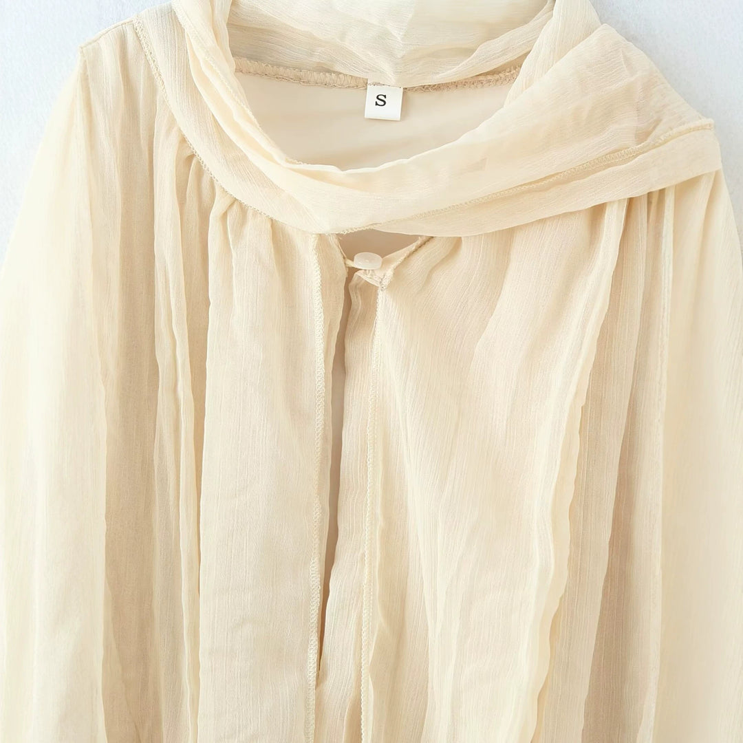 Damen Fließende Chiffon‑Plissee‑Bluse mit Schluppe und Manschetten Echoarchiv